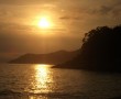 Papel de Parede Pôr-do-sol na Praia: Morro